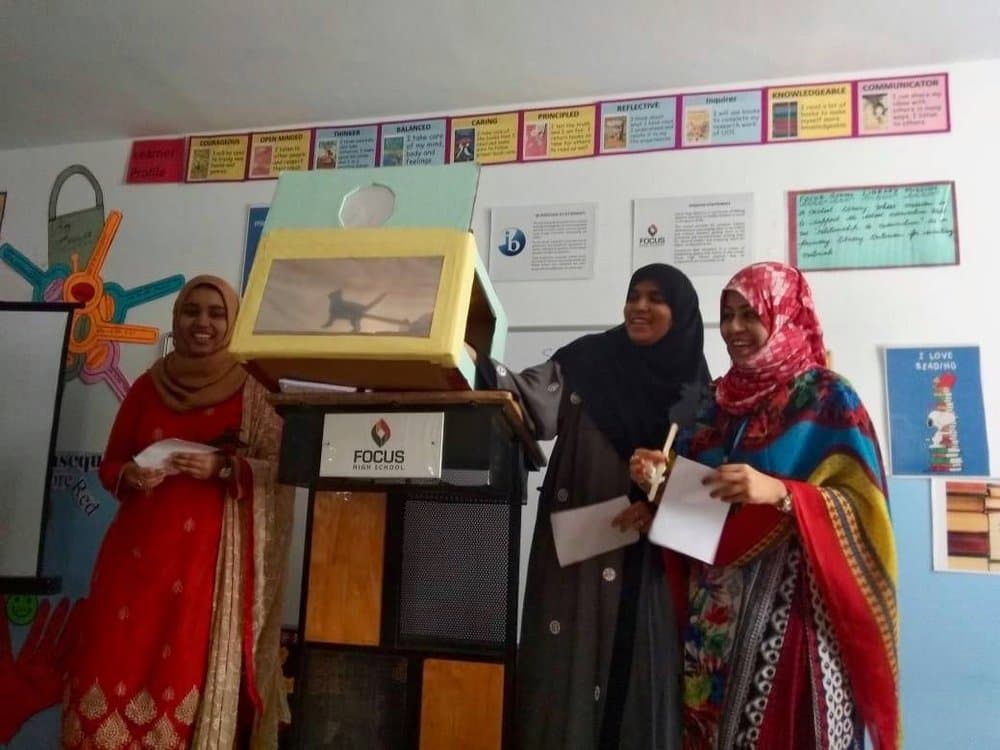 Participants presenting at the podium