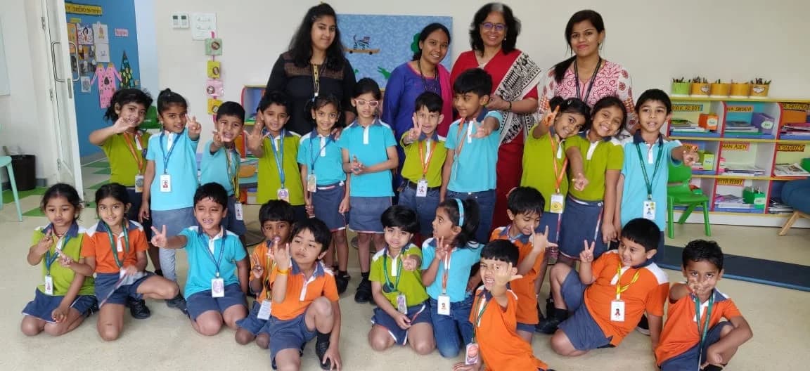 Group photo of the children and teachers after the session